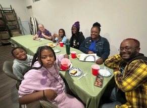 Church family sharing a fellowship lunch