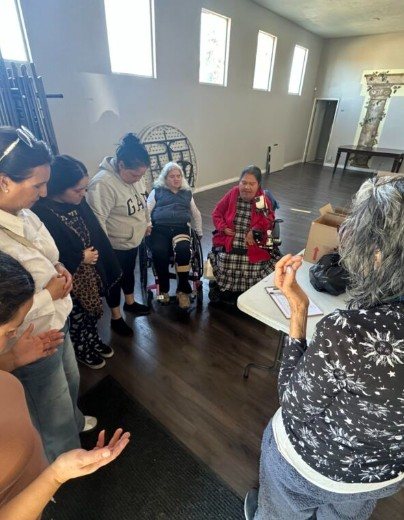 Church members praying together